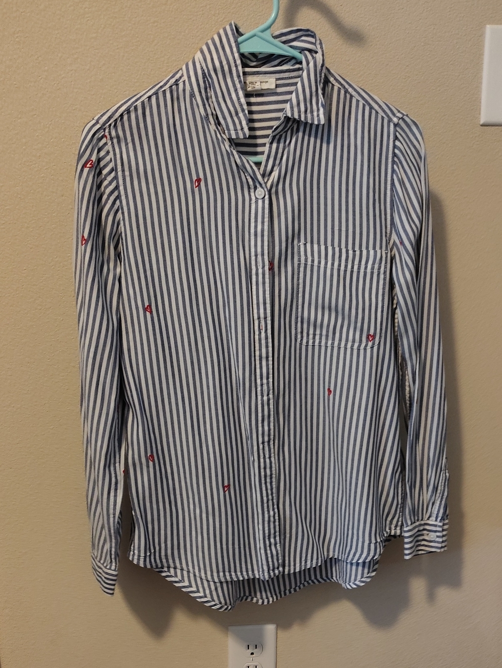 Striped Blue and White Button-Up Shirt with Subtle Red Heart Accent